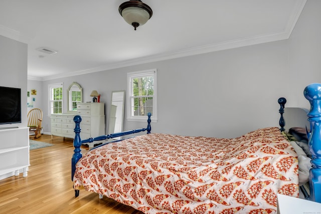 19 W Hills Rd, Essex, CT 06442 - bedroom with crown molding, wood finished floors, and multiple windows