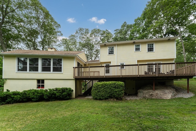 19 W Hills Rd, Essex, CT 06442 - back of property with a deck, stairway, and a lawn
