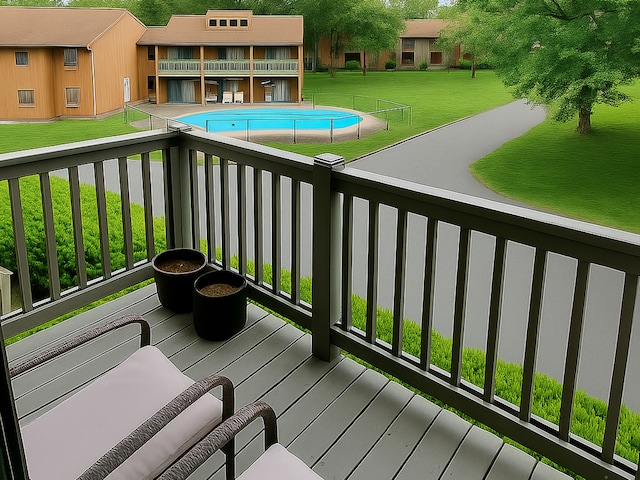30 Riverview Dr Unit 30, Bridgeport, CT 06606 - wooden terrace featuring an outdoor pool and a yard