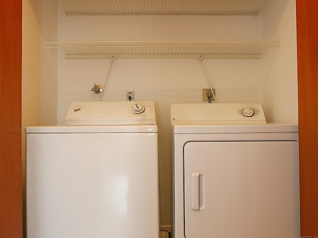 30 Riverview Dr Unit 30, Bridgeport, CT 06606 - laundry area with washer and clothes dryer