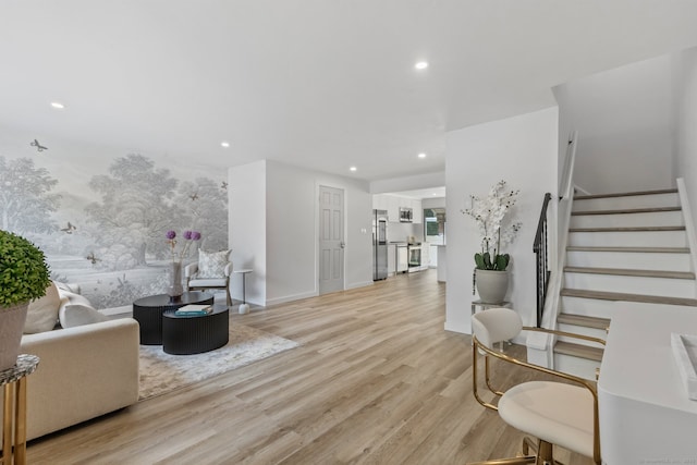 17 Avon Ln, Stamford, CT 06907 - living area with light wood-style floors, stairway, recessed lighting, and baseboards