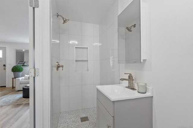 17 Avon Ln, Stamford, CT 06907 - bathroom with a stall shower, vanity, and wood finished floors