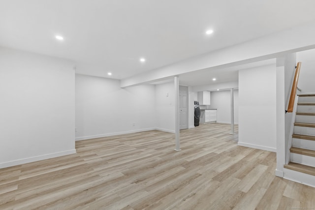 17 Avon Ln, Stamford, CT 06907 - finished below grade area with recessed lighting, stairs, light wood-type flooring, and baseboards