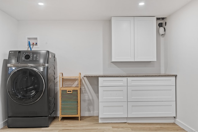 17 Avon Ln, Stamford, CT 06907 - washroom featuring washer / dryer, light wood finished floors, cabinet space, recessed lighting, and baseboards