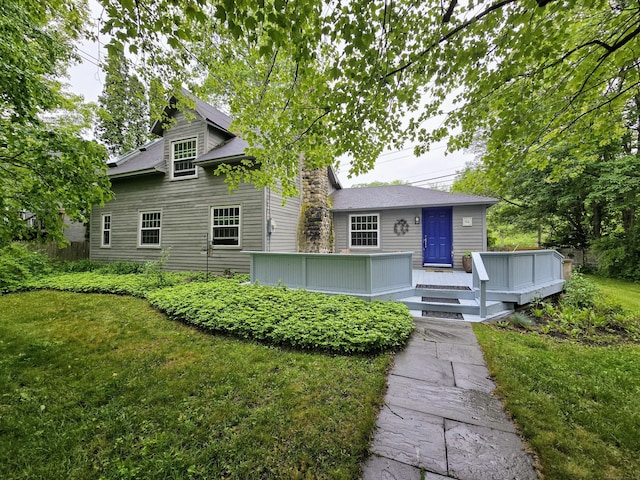 44 Wilbur Rd, Washington, CT 06777 - view of front facade featuring a wooden deck and a front lawn