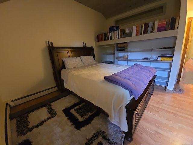 44 Wilbur Rd, Washington, CT 06777 - bedroom with light wood-style floors and a baseboard radiator