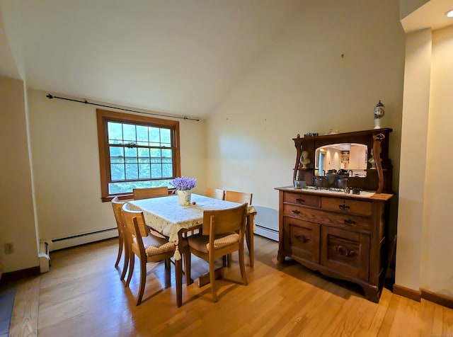 44 Wilbur Rd, Washington, CT 06777 - dining area with baseboard heating, light wood finished floors, vaulted ceiling, and baseboards