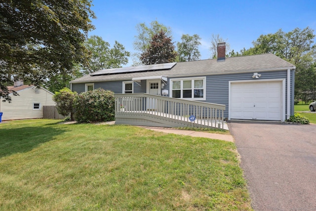 803 Nott St, Wethersfield, CT 06109 - ranch-style home featuring a garage, a chimney, solar panels, and asphalt driveway