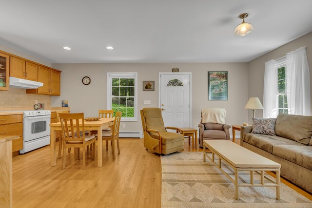 35 Whitethorn Dr, Guilford, CT 06437 - living area featuring light wood-type flooring, recessed lighting, and a baseboard heating unit