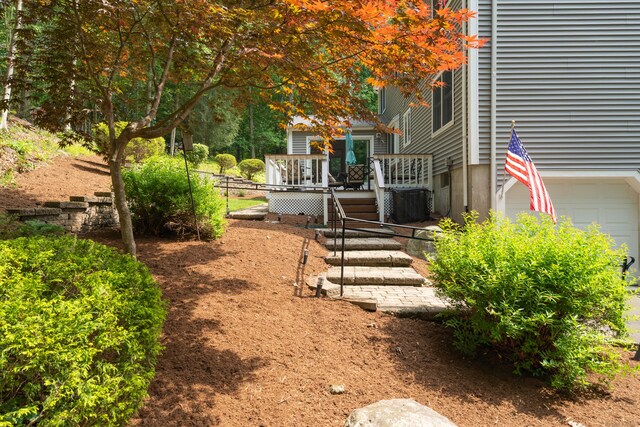 35 Whitethorn Dr, Guilford, CT 06437 - view of yard with a deck and an attached garage
