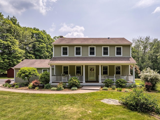 47 Davis Rd, Mansfield, CT 06268 - view of front of home with a chimney, a front lawn, and covered porch