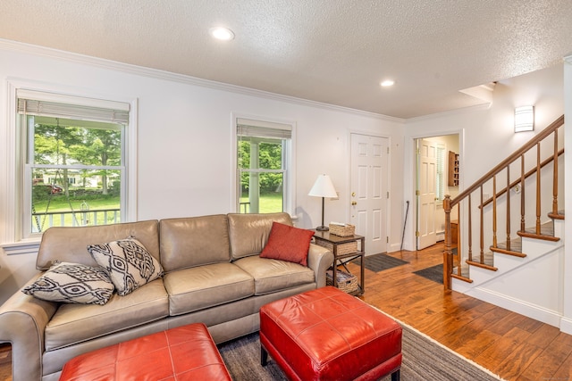 47 Davis Rd, Mansfield, CT 06268 - living area featuring wood finished floors, crown molding, a textured ceiling, stairway, and recessed lighting