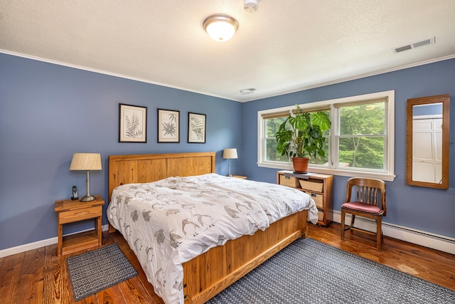 47 Davis Rd, Mansfield, CT 06268 - bedroom with wood finished floors and crown molding