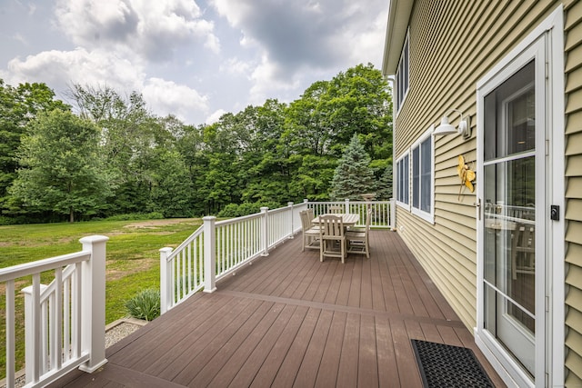 47 Davis Rd, Mansfield, CT 06268 - wooden terrace with a lawn, outdoor dining space, and view of wooded area