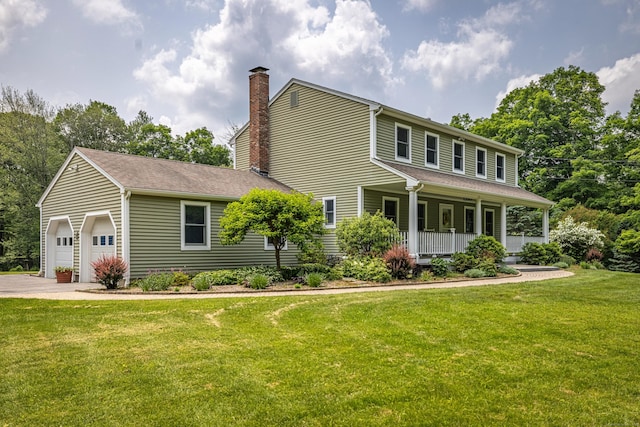 47 Davis Rd, Mansfield, CT 06268 - view of front of property with a porch, a chimney, a front lawn, and an attached garage