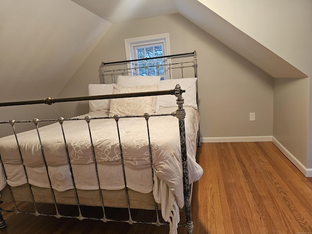 262 Meyer Rd, Torrington, CT 06790 - unfurnished bedroom featuring wood finished floors and vaulted ceiling