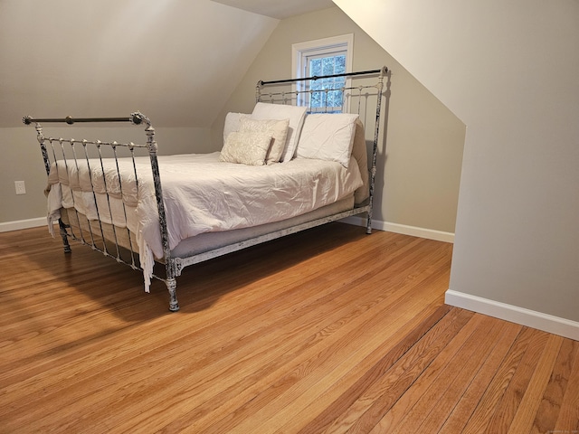 262 Meyer Rd, Torrington, CT 06790 - bedroom with light wood-style floors and vaulted ceiling