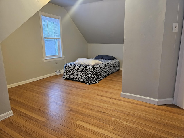 262 Meyer Rd, Torrington, CT 06790 - bedroom with wood finished floors and vaulted ceiling