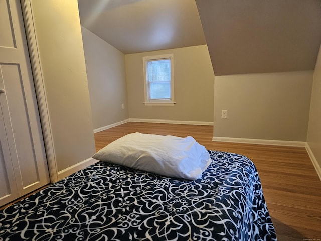 262 Meyer Rd, Torrington, CT 06790 - bedroom featuring lofted ceiling and wood finished floors