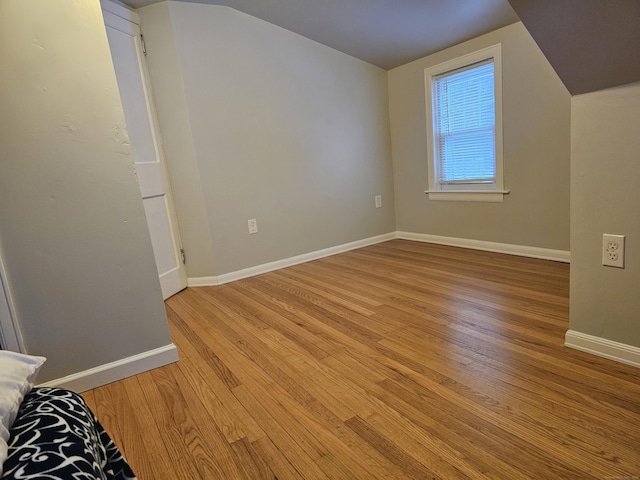 262 Meyer Rd, Torrington, CT 06790 - unfurnished bedroom with lofted ceiling and light wood-style floors