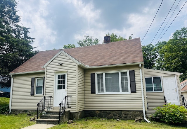 262 Meyer Rd, Torrington, CT 06790 - view of front facade with entry steps, a chimney, and a shingled roof
