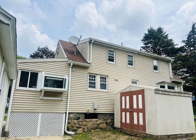 262 Meyer Rd, Torrington, CT 06790 - back of house featuring a storage shed
