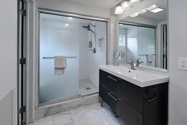 29 Bayberry Rd, Fairfield, CT 06825 - bathroom featuring a shower stall, vanity, and marble look tiles