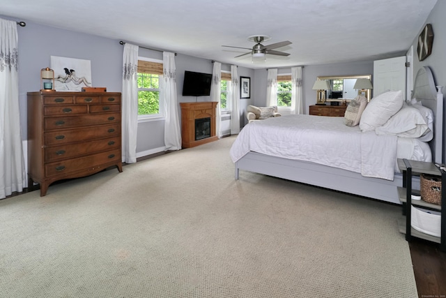 29 Bayberry Rd, Fairfield, CT 06825 - carpeted bedroom featuring ceiling fan and a glass covered fireplace