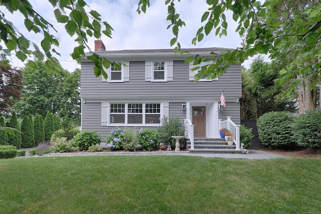29 Bayberry Rd, Fairfield, CT 06825 - colonial house featuring a chimney and a front lawn