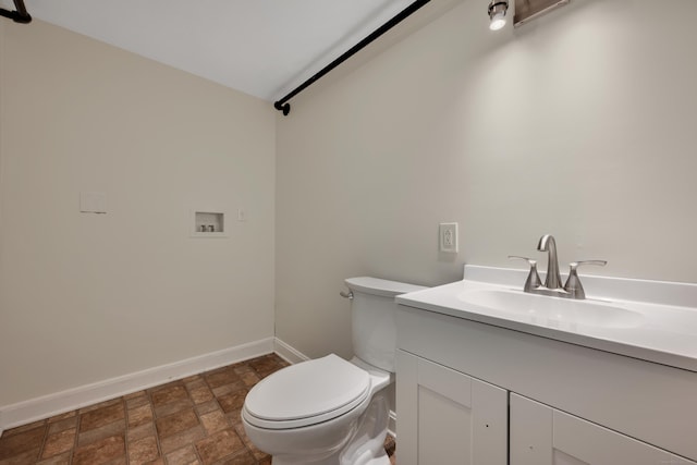 824 Torringford W St, Torrington, CT 06790 - bathroom featuring vanity and stone finish floors