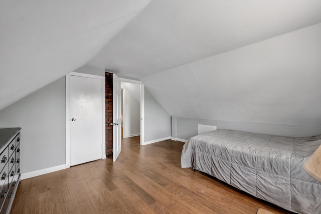824 Torringford W St, Torrington, CT 06790 - bedroom with wood finished floors and vaulted ceiling