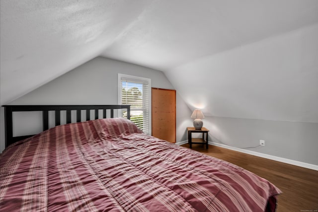 824 Torringford W St, Torrington, CT 06790 - bedroom with vaulted ceiling and wood finished floors