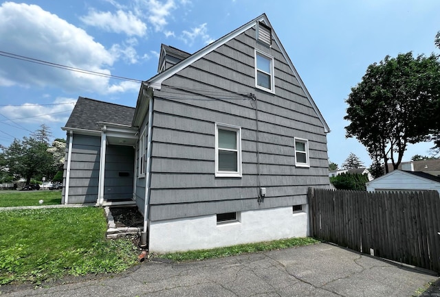 17 Rock Spring Rd, Stamford, CT 06906 - view of side of home featuring a shingled roof