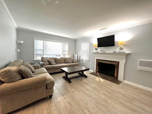 17 Rock Spring Rd, Stamford, CT 06906 - living area with crown molding, light wood-style flooring, and a fireplace with flush hearth
