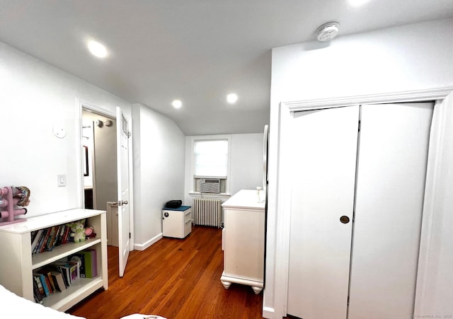 17 Rock Spring Rd, Stamford, CT 06906 - laundry room featuring radiator, dark wood finished floors, cooling unit, and recessed lighting