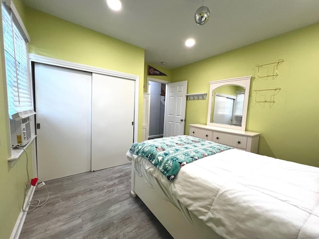 17 Rock Spring Rd, Stamford, CT 06906 - bedroom with wood finished floors, a closet, recessed lighting, and cooling unit