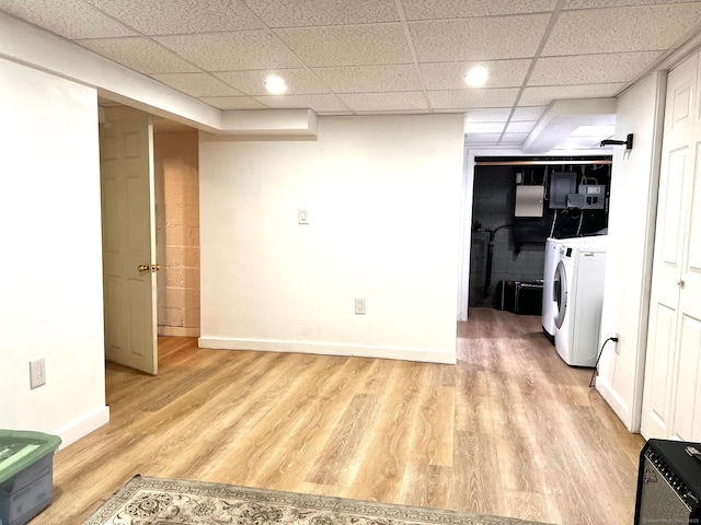 17 Rock Spring Rd, Stamford, CT 06906 - finished basement with independent washer and dryer, light wood-style floors, a drop ceiling, and recessed lighting