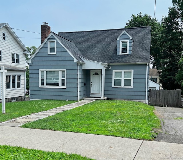 17 Rock Spring Rd, Stamford, CT 06906 - view of front of home featuring roof with shingles and a chimney