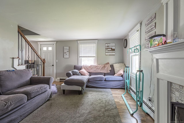 12 John St, Killingly, CT 06239 - living area featuring stairway and wood finished floors