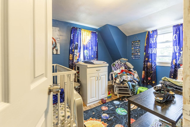 12 John St, Killingly, CT 06239 - bedroom featuring wood finished floors and lofted ceiling