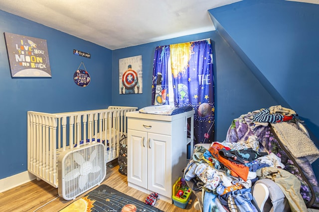 12 John St, Killingly, CT 06239 - bedroom featuring light wood finished floors