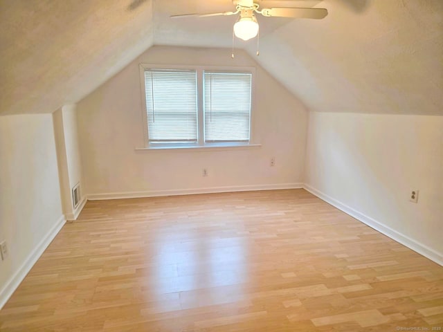 149 Branford St, Manchester, CT 06040 - additional living space featuring a ceiling fan, light wood-style floors, baseboards, and lofted ceiling