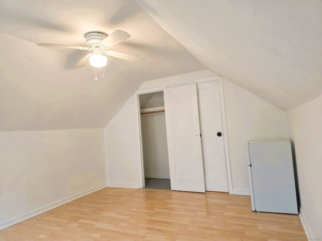 149 Branford St, Manchester, CT 06040 - additional living space with light wood-style flooring, a ceiling fan, baseboards, and lofted ceiling