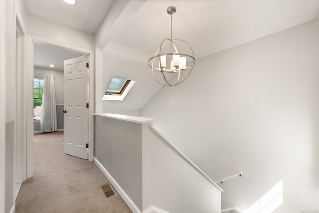 75 Brittania Rd Unit 75, Danbury, CT 06811 - corridor featuring an upstairs landing, light carpet, a skylight, recessed lighting, and a chandelier