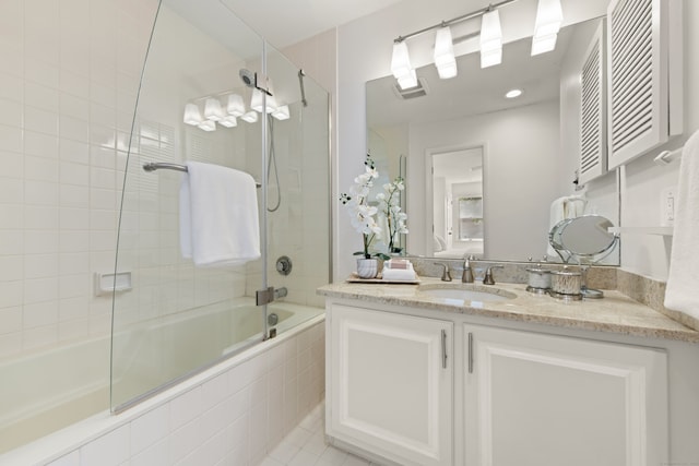 75 Brittania Rd Unit 75, Danbury, CT 06811 - bathroom featuring tiled shower / bath, vanity, and tile patterned floors