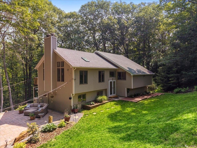 2 Round Hill Rd, Shelton, CT 06484 - view of front of property with a patio area, an outdoor hangout area, a chimney, a front lawn, and roof with shingles