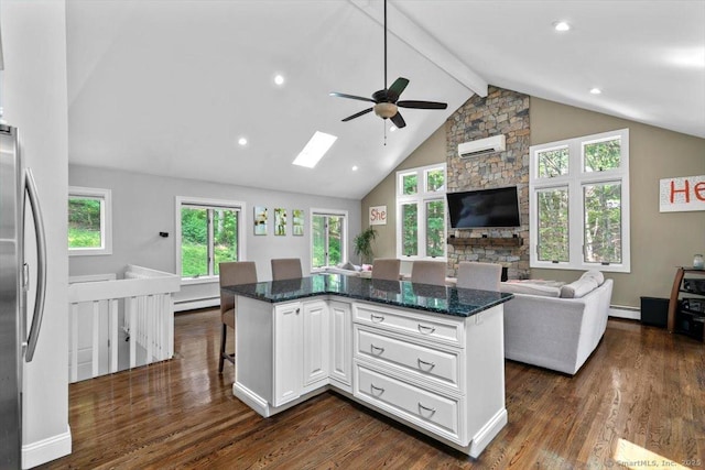 2 Round Hill Rd, Shelton, CT 06484 - kitchen with open floor plan, a ceiling fan, a baseboard heating unit, dark wood-style flooring, and beam ceiling