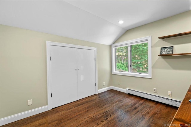2 Round Hill Rd, Shelton, CT 06484 - unfurnished bedroom with baseboard heating, vaulted ceiling, dark wood finished floors, recessed lighting, and a closet