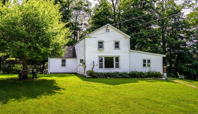 126 Christain Hill Rd, Dover, NY 12522 - back of property with a lawn and view of scattered trees
