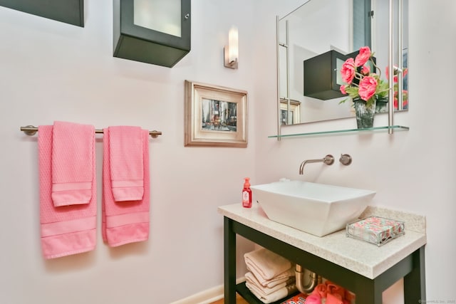 8 Hedgerow Cmn, Weston, CT 06883 - bathroom featuring vanity and baseboards